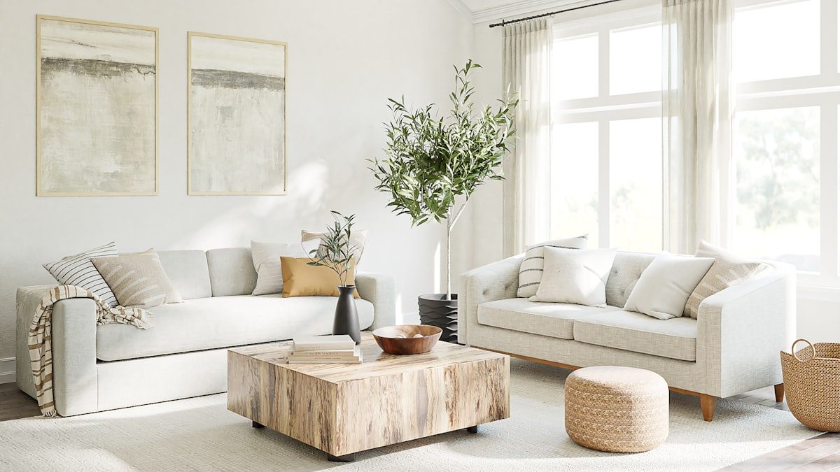 A bright, tidy living room with a large window